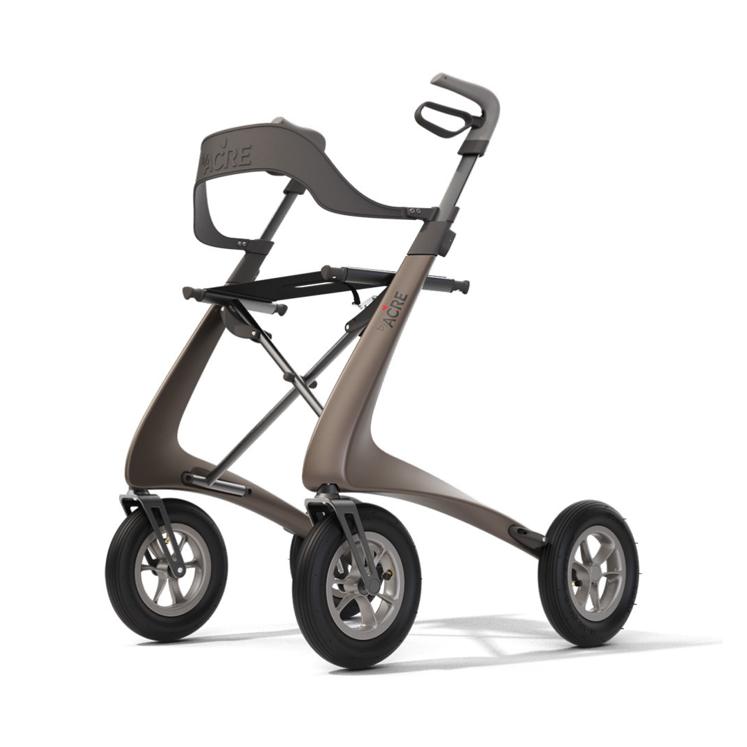 The ByACRE Carbon Overland All-Terrain Rollator is a modern, lightweight walker with four large wheels, a curved frame, ergonomic handlebar, and built-in backrest—perfect for enhanced mobility and support on any adventure.